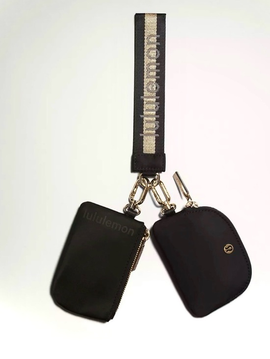 lululemon athletica Handbags - lululemon athletica Black keychain pouch with Gold Accents